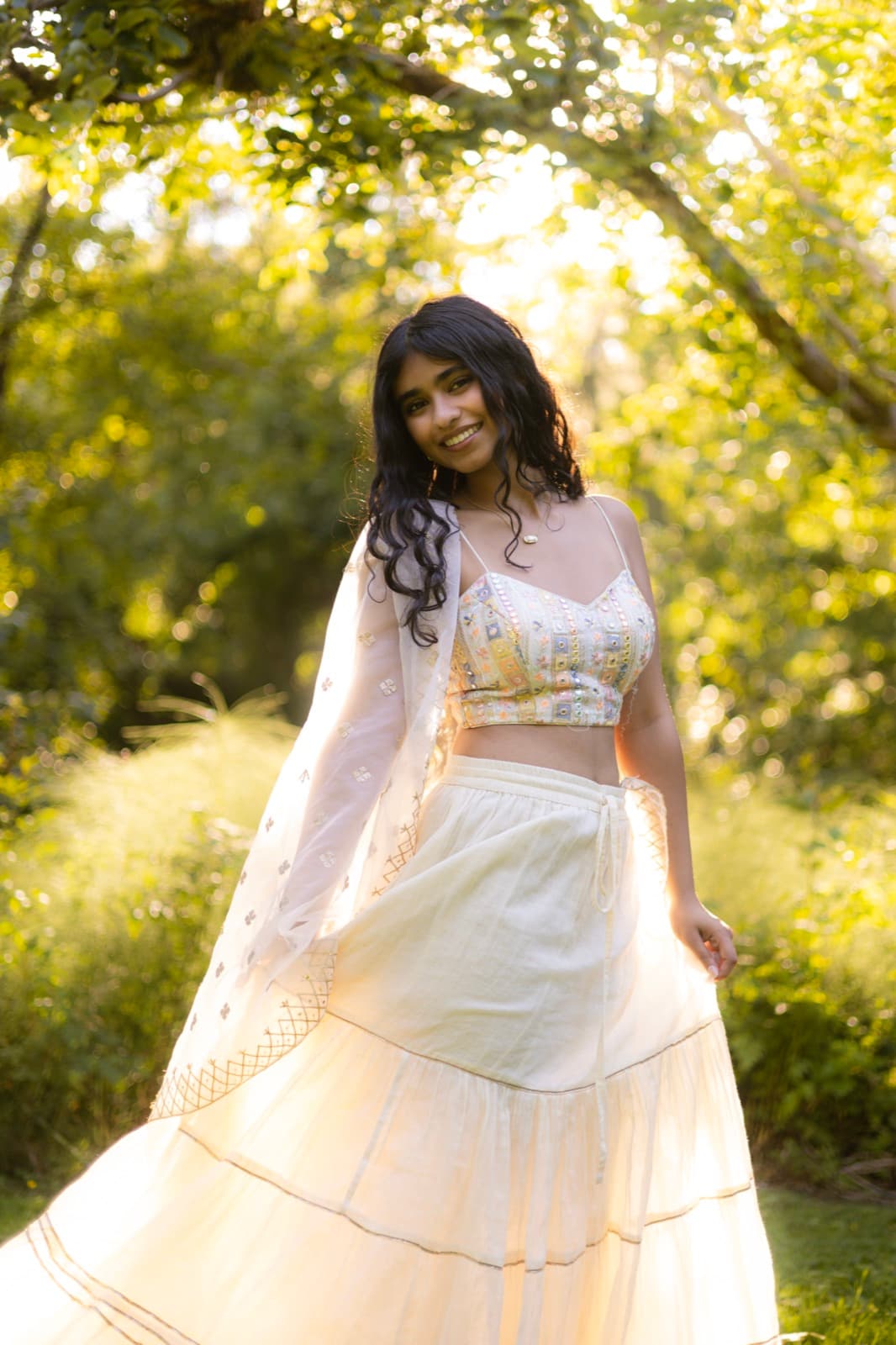Senior portrait session in dappled evening light