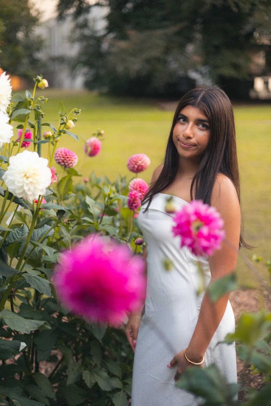 Senior portrait session in a dahlia garden